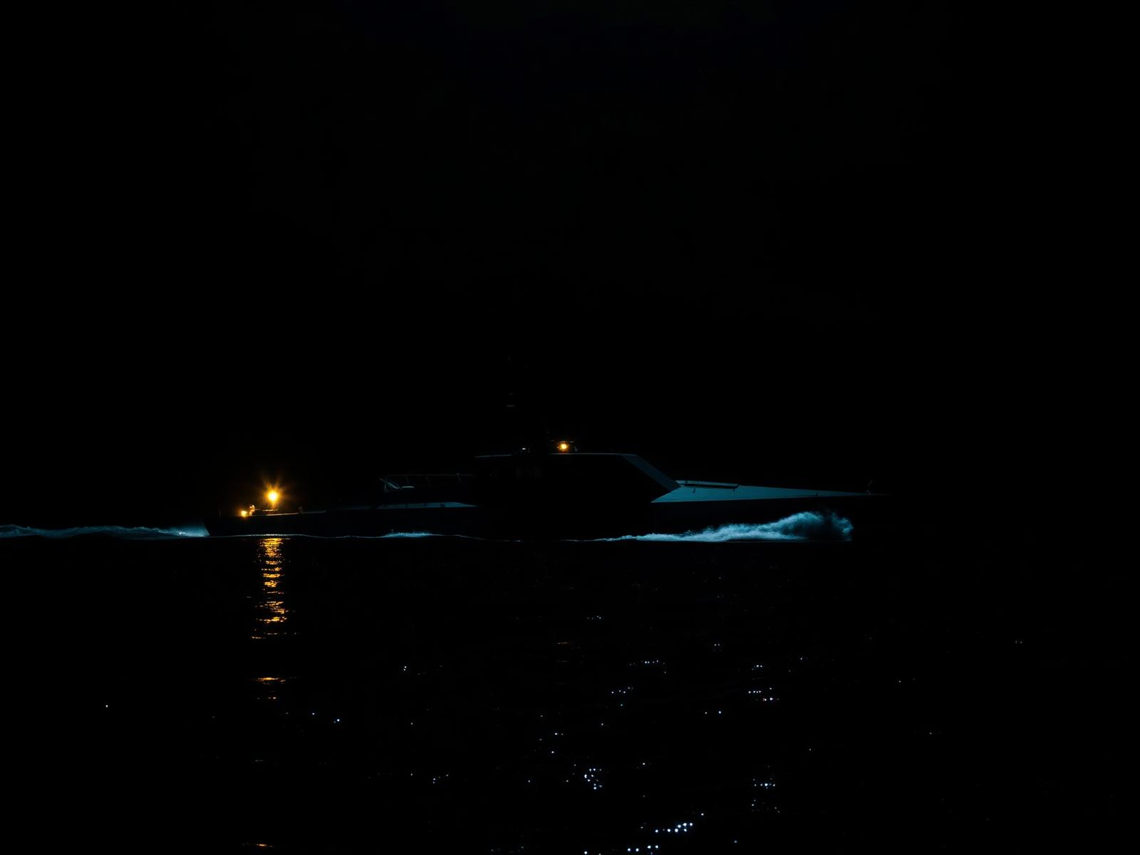 Siren USV operating in Port Tampa Bay at night